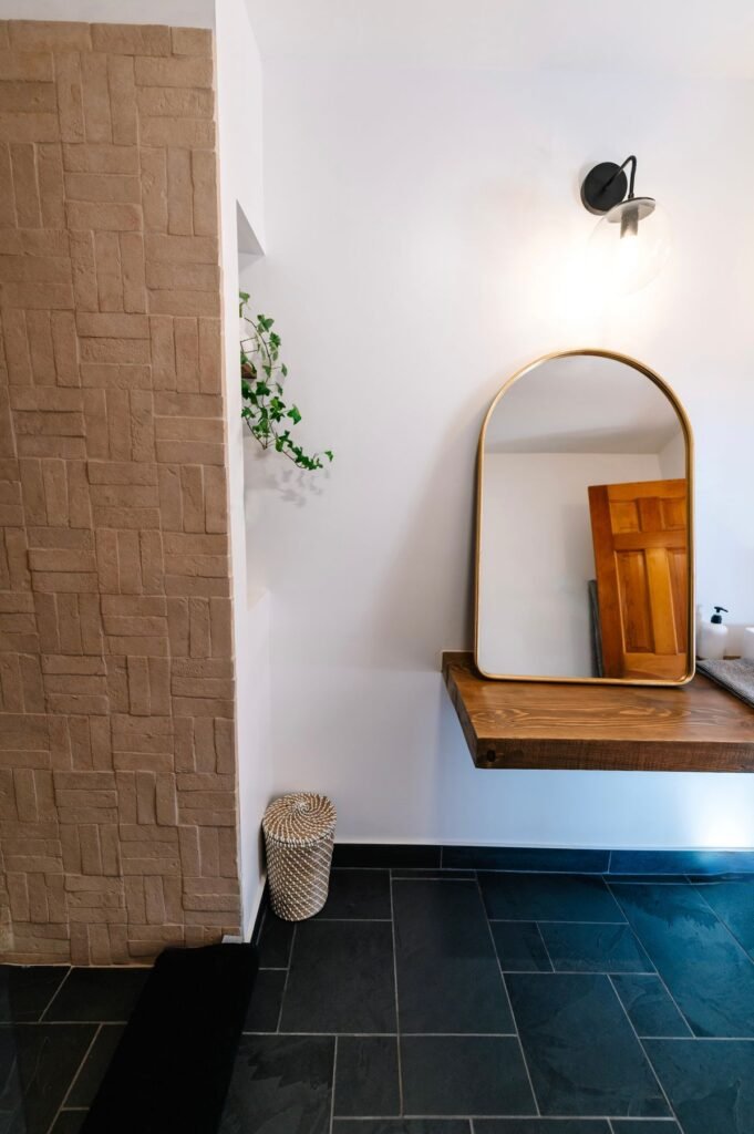 Modern bathroom with wooden vanity and mirror