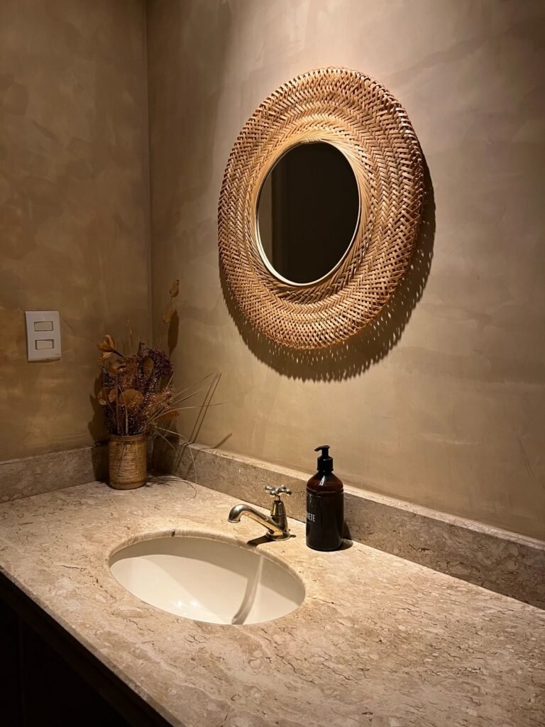 Bathroom vanity with wicker mirror