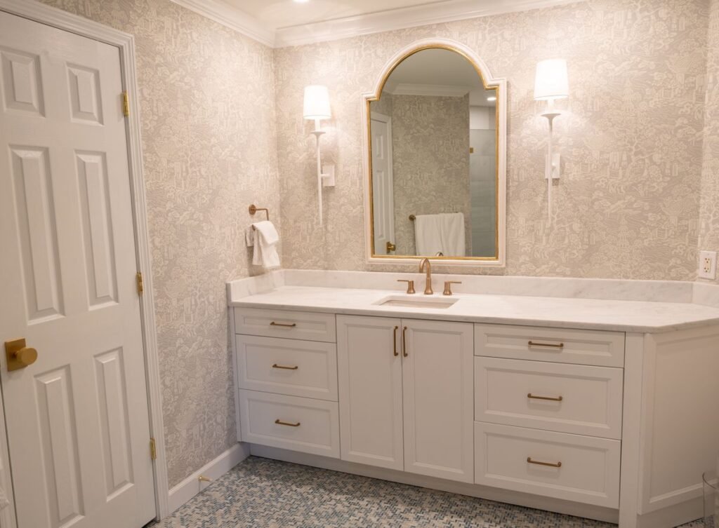 Powder room with mirror and sconces