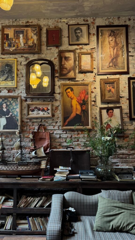 Living room gallery wall with vintage artwork