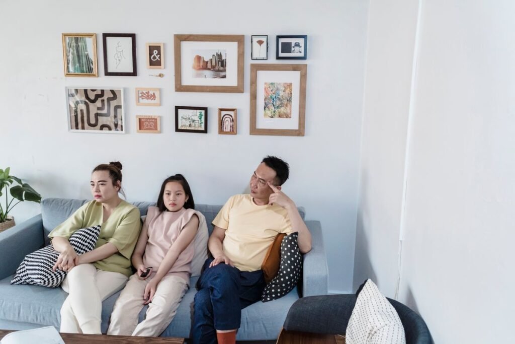 family photo wall in a living room